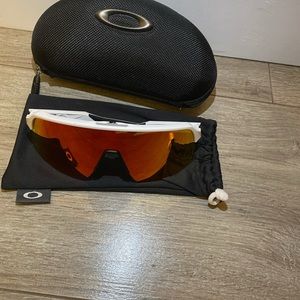 Red and white Oakley sutro
